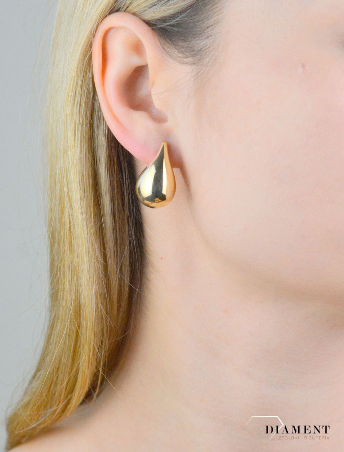 Kolczyki złote łezki próba 375, KL 12164D 375 Stylowe kolczyki wykonane z wysokiej jakości złota próby 375. Kolczyki to ponadczasowa biżuteria, która pasuje do każdego rodzaju stylizacji. Dzięki tak wyjątkowej formie kolczyki te prze.jpg